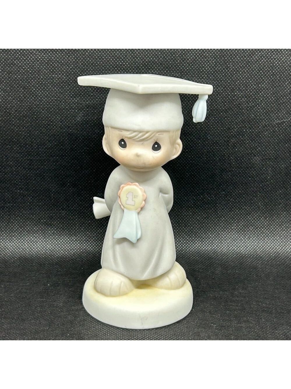 Precious Moments “God Bless You Graduate" figurine